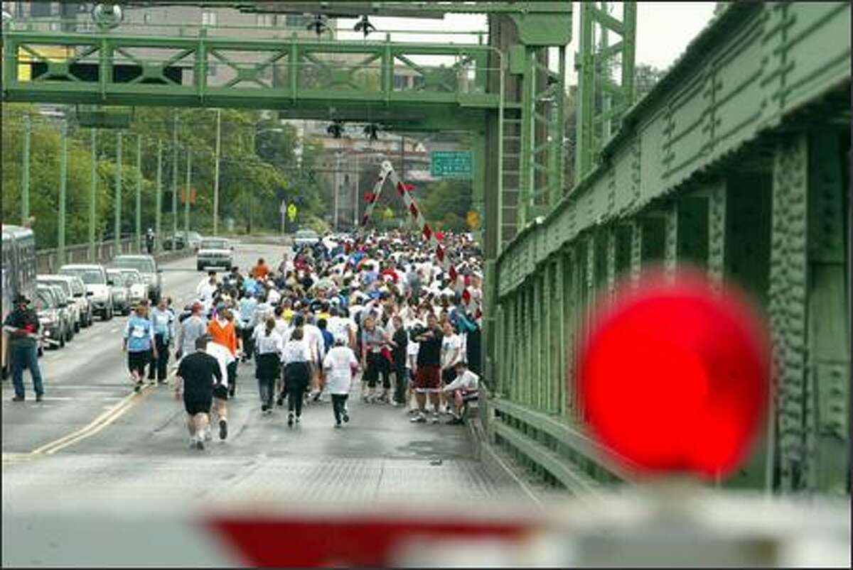 There go the last runners to make it across the University Bridge before it went up for 20 minutes during the 25th Nordstrom "Beat the Bridge to Beat Diabetes" race. The bridge, which stood at the 2-mile mark along the 8K course, was raised for 20 minutes.