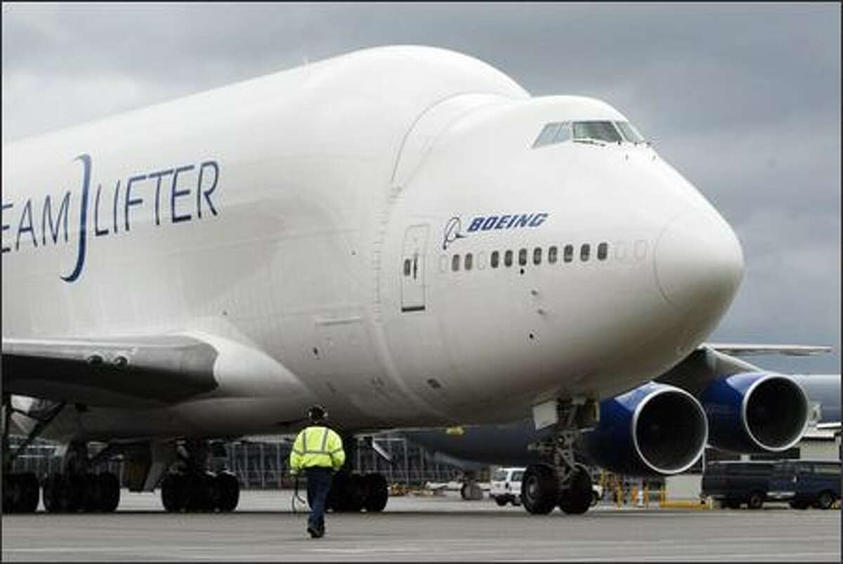 A modified 747, the Dreamlifter, taxis to a stop while ferrying a horizontal stabilizer for the new Boeing 787 Dreamliner from Italy, the first component transported to Boeing's Everett plant on Tuesday.