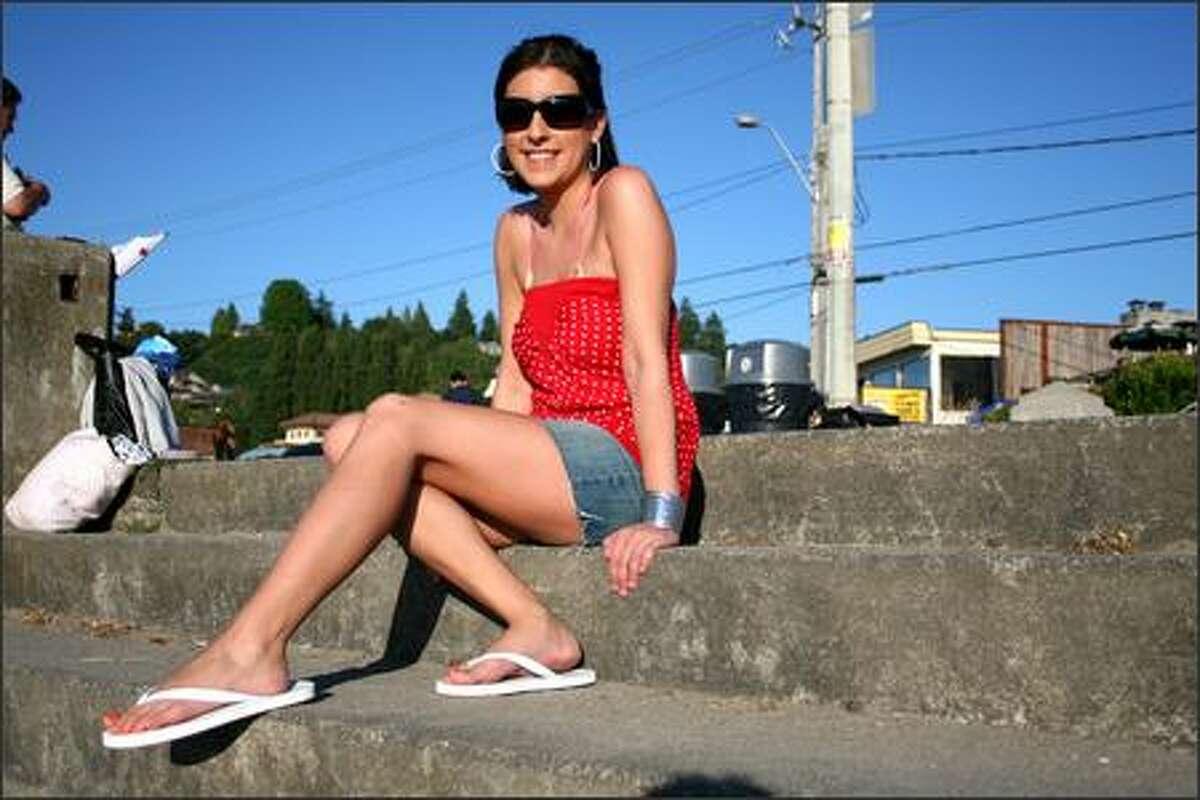 Karissa Finch enjoys the sunshine down at Alki Beach. She describes her style as "summer." She likes to shop at Forever 21.