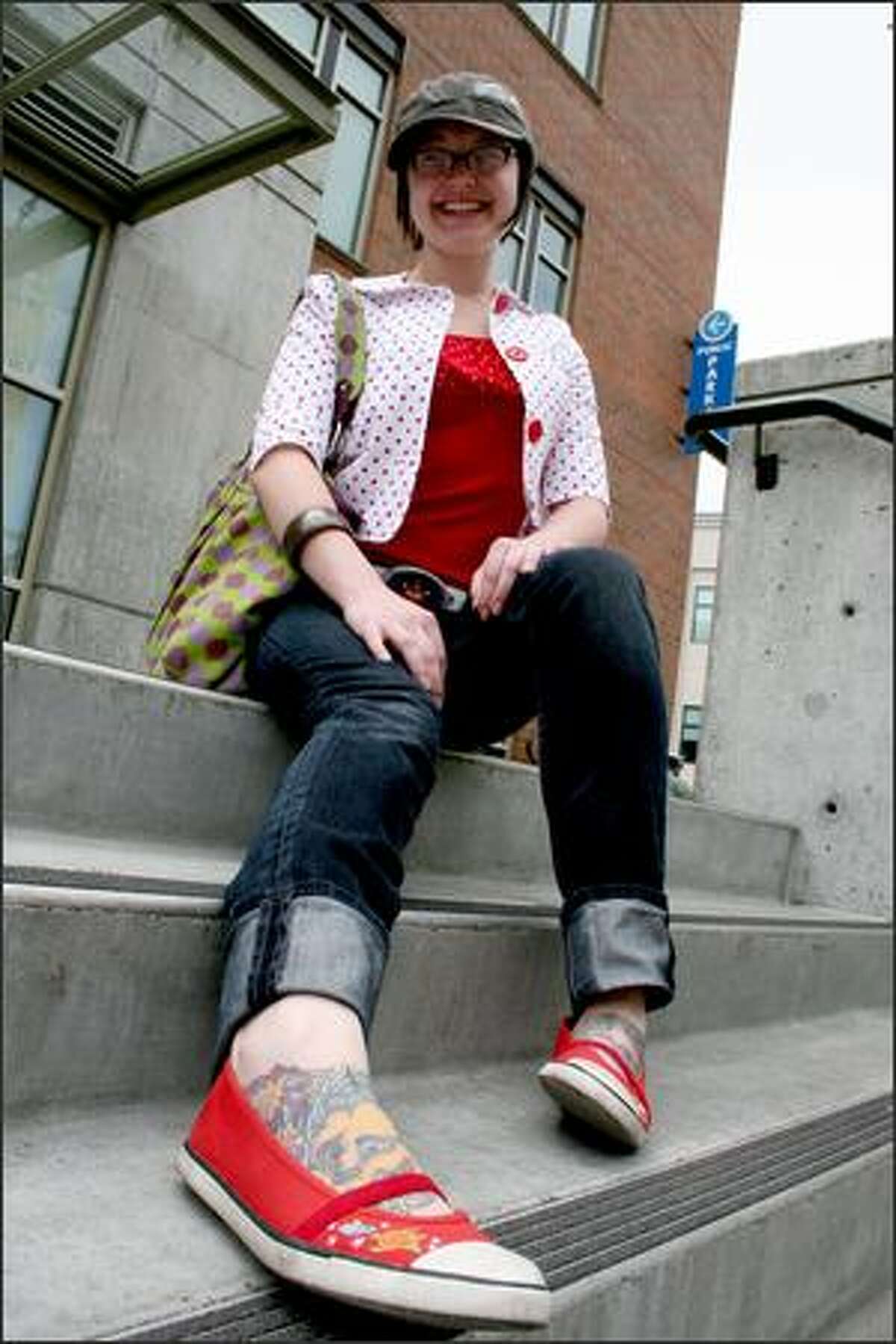 Alexis Macauley relaxes outside the Sunday market. She goes for an "eclectic" style and shops at Anthropology.