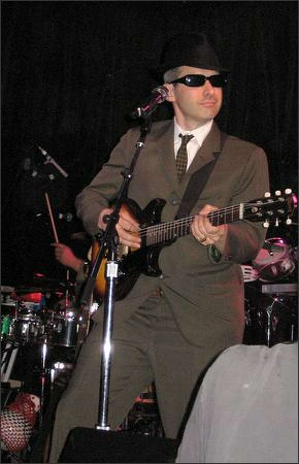 Beastie Boy Ad Rock looks cool while playing the guitar during an intimate show at the Crocodile Cafe on May 25, 2007.