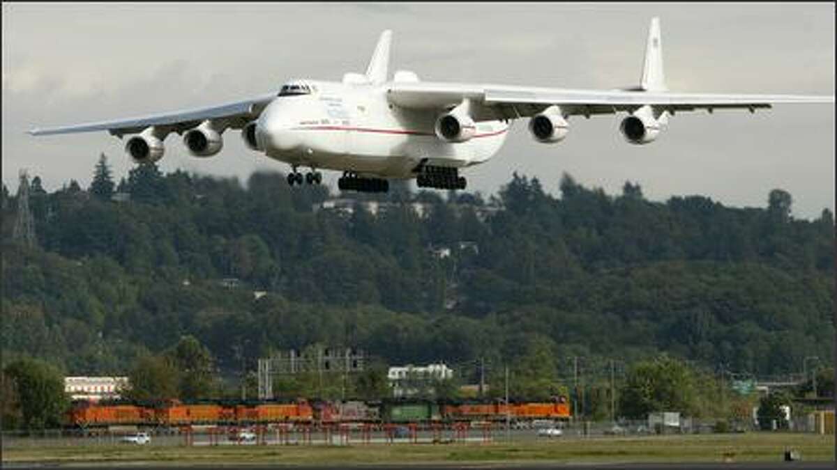 The world's biggest plane, the Russian-built Antonov An-225, landed at Boeing Field about 5 p.m. Friday after a flight from Rickenbacker cargo airport in Columbus, Ohio. The six-engine cargo plane delivered several General Electric engines for Boeing 777s that are now in production. The GE-90 engine for the 777 is the most powerful jet engine made today. Engines for Boeing's jetliners are delivered to Boeing Field because that's where the company's propulsion unit is located. The 777 engines will later be transported to Everett for attachment to the planes. The engines are normally flown to Boeing Field from the engine makers in smaller cargo planes.