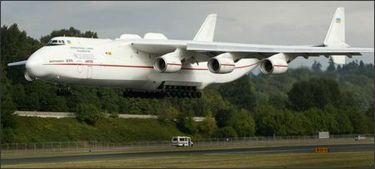 The Antonov An-225, the world's largest airplane, lands at Boeing Field in Seattle on Friday, August 31, 2007. The giant plane, with three engines under each wing, landed to pick up four 777 engines for a delivery.
