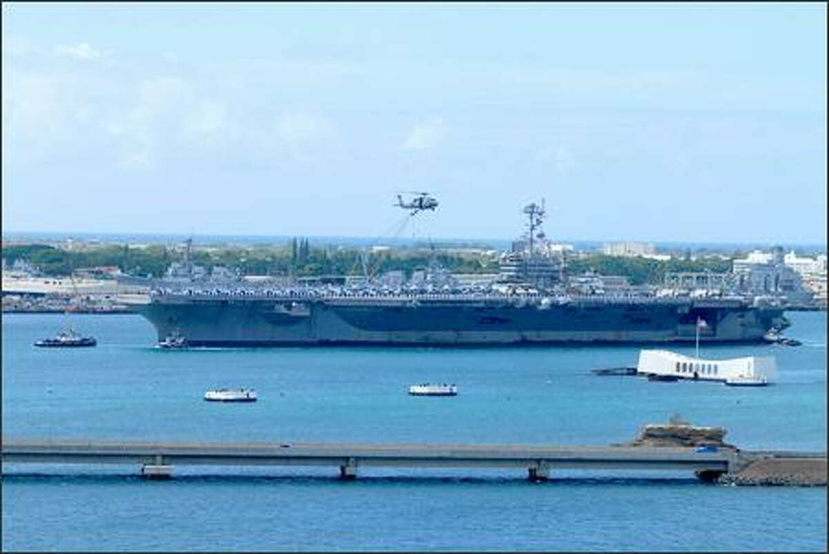 The Bremerton-based aircraft carrier USS John C. Stennis arrived in Pearl Harbor Monday, en route home from a seven-month deployment that took it to the Western Pacific and into the Persian Gulf near Iran, and earlier this month off Guam, participating in the largest joint military exercise in recent history, Navy officials said. (U.S. Navy photo by Mass Communication Specialist 3rd Class Paul J. Perkins)