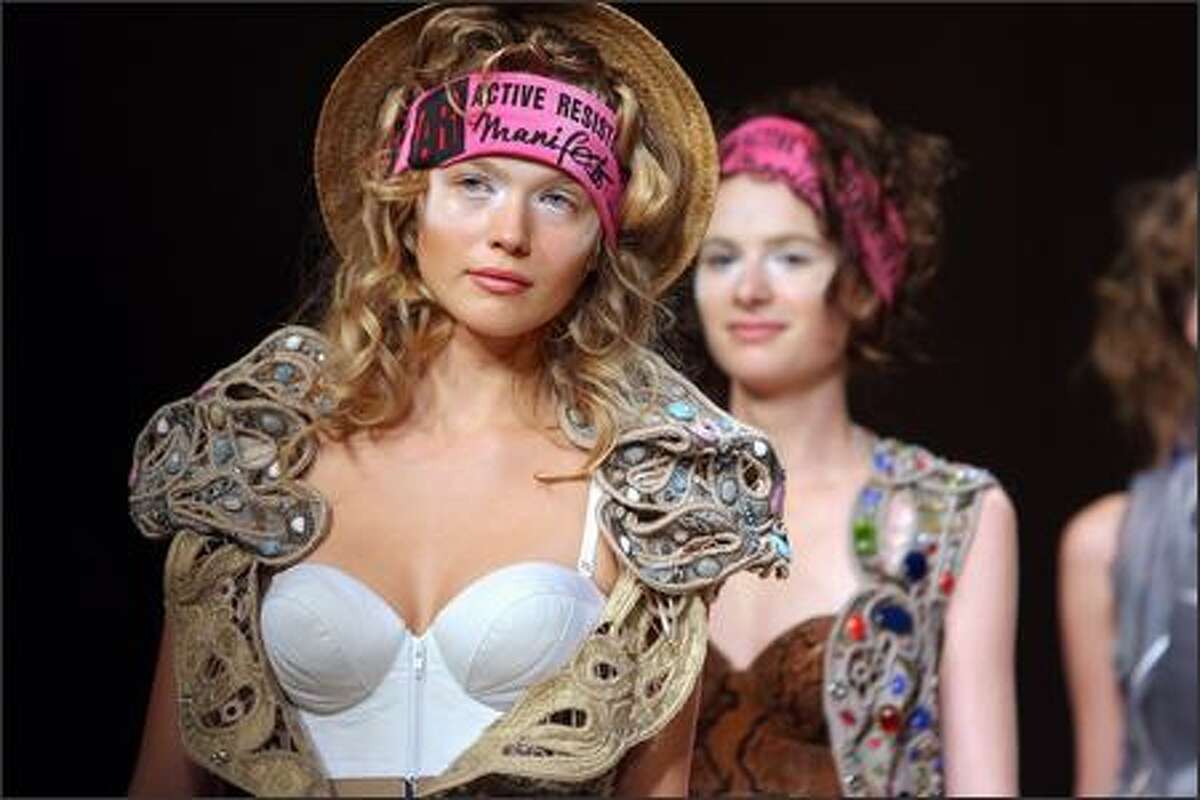 A model displays a creation by British fashion designer Vivienne Westwood  during her Ready-to-Wear 2007 Spring-Summer fashion show held at the  Carrousel du Louvre, in Paris, France, on October 3, 2006. Photo