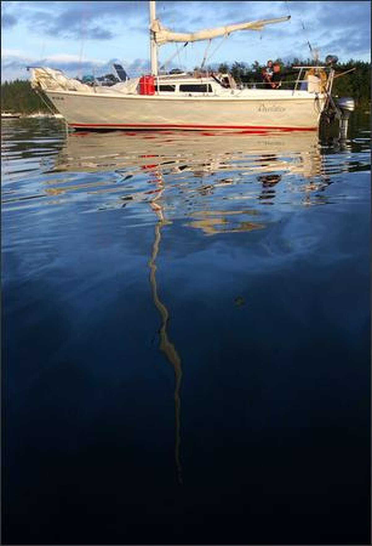 A sailboat at anchor in Roche Harbor, one of the few fuel and food stops for boats in the northern San Juan Islands.