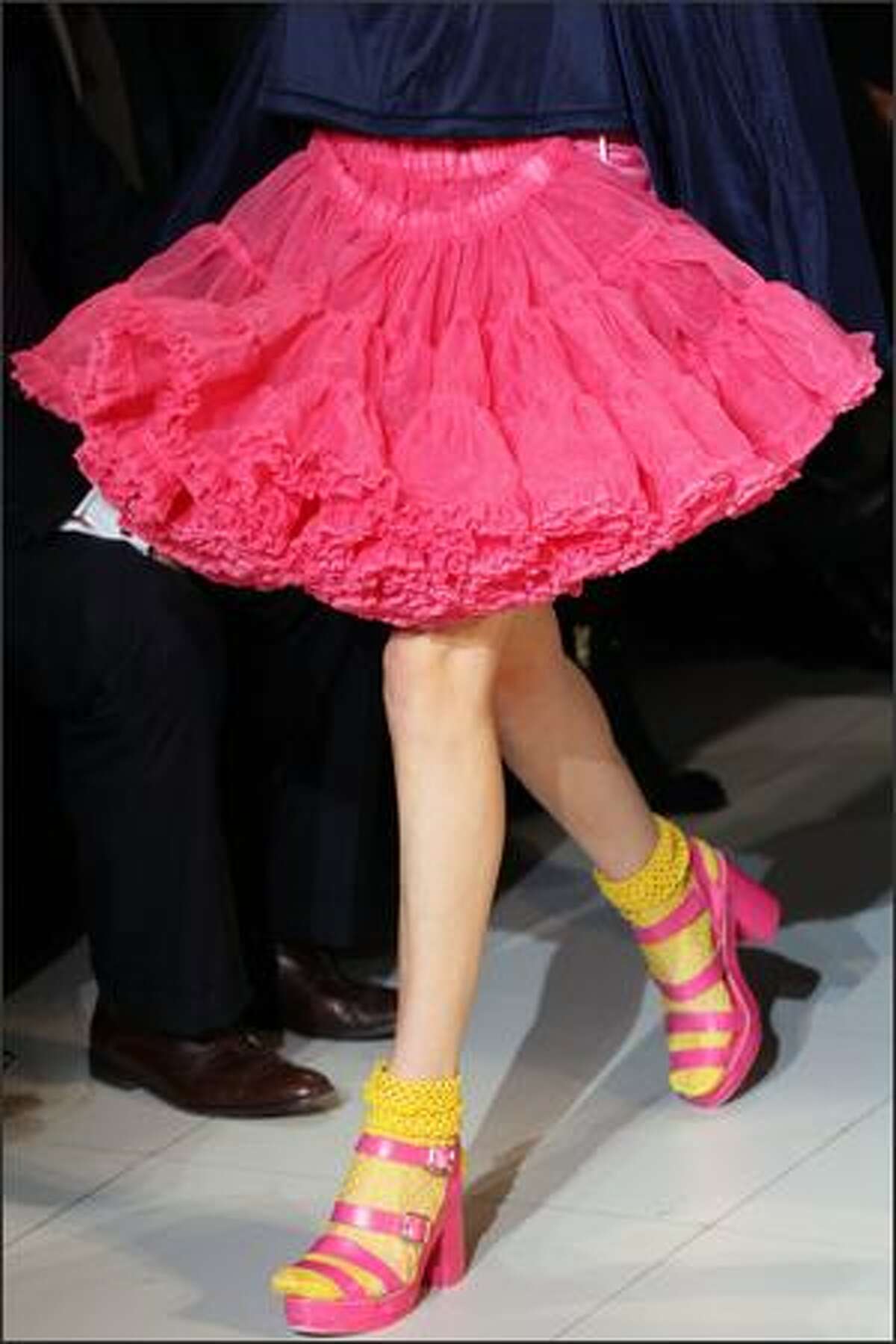 A model presents a creation by Comme des Garcons during the Spring/Summer 2008 ready-to-wear collection show in Paris.