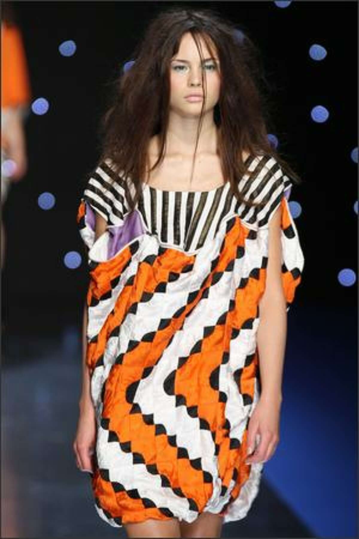 A model presents a creation by Japanese designer Tsumori Chisato during the Spring/Summer 2008 ready-to-wear collection show in Paris.