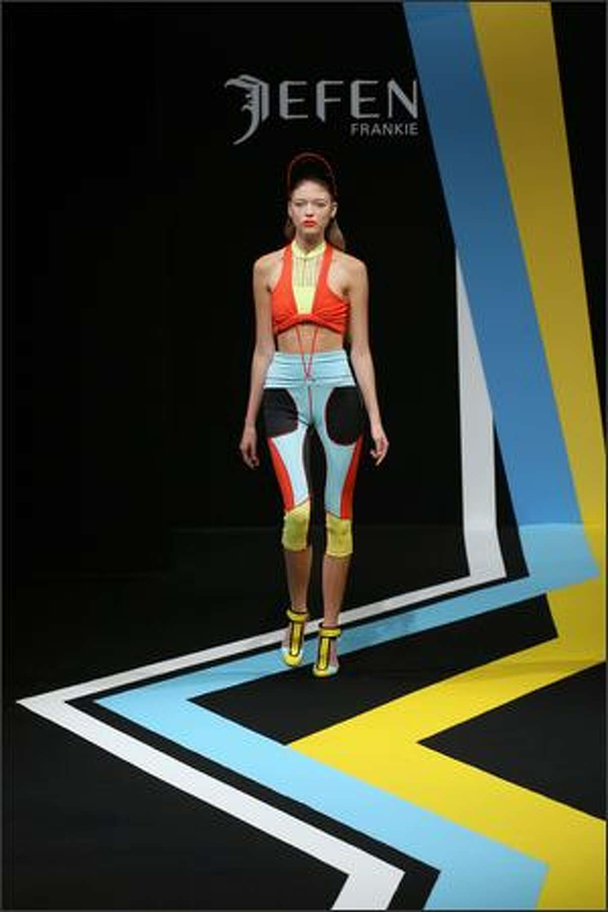 A model presents a creation by Chinese designer Frankie Xie for Jefen during the Spring/Summer 2008 ready-to-wear collection show in Paris, 30 September 2007. AFP PHOTO FRANCOIS GUILLOT