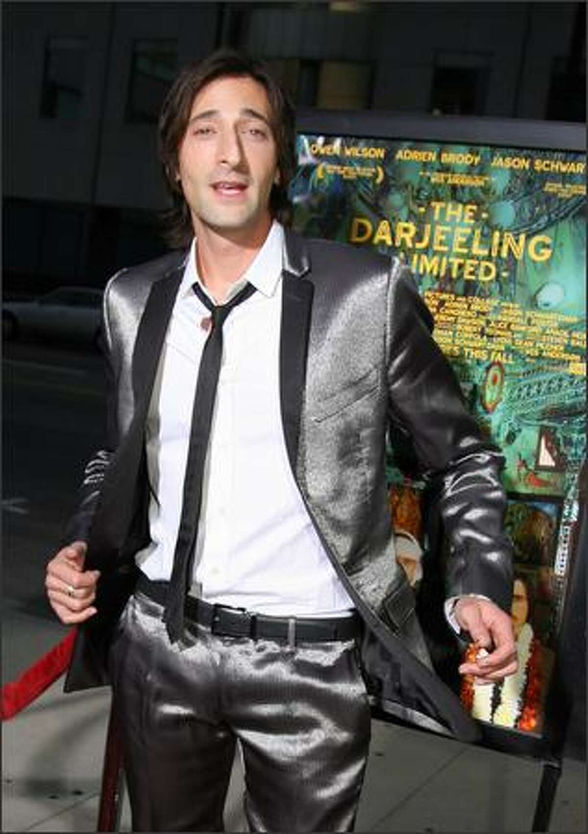 The leather belt of Adrien Brody in aboard the Darjeeling Limited