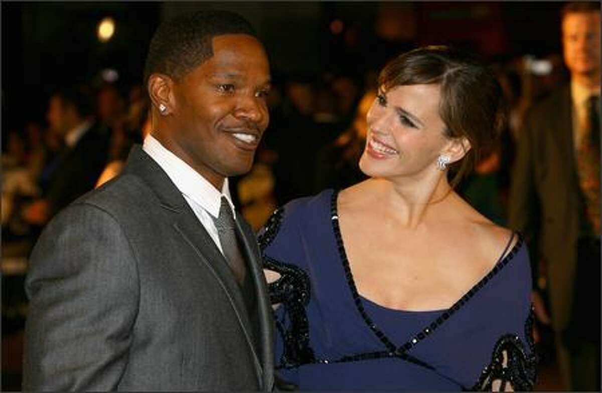 Jamie Foxx and Jennifer Garner attend The Kingdom film premiere held at the Odeon West End on October 4, 2007 in London.