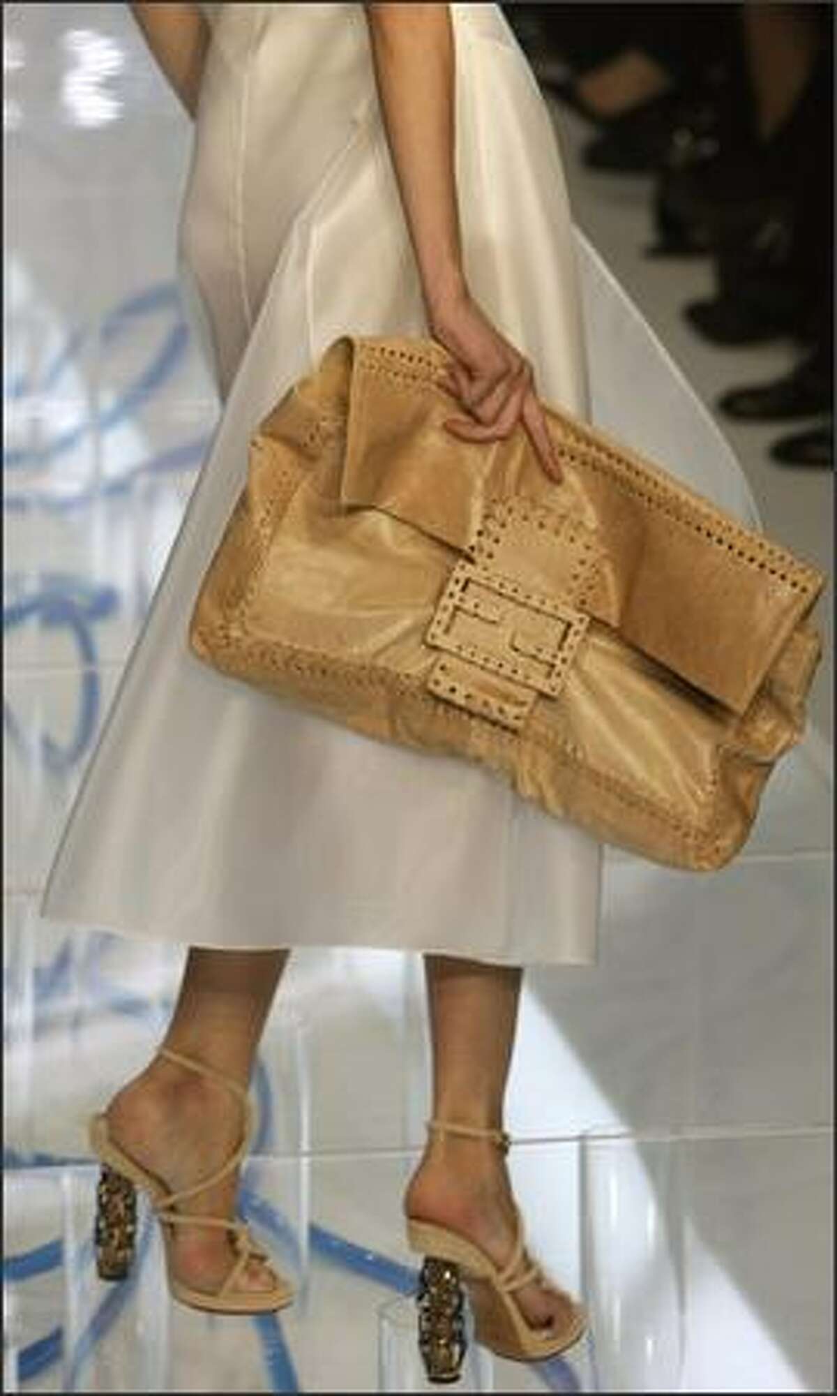 A model presents a creation by Fendi during the Spring/Summer 2008 collections of the Milan ready-to-wear fashion shows.