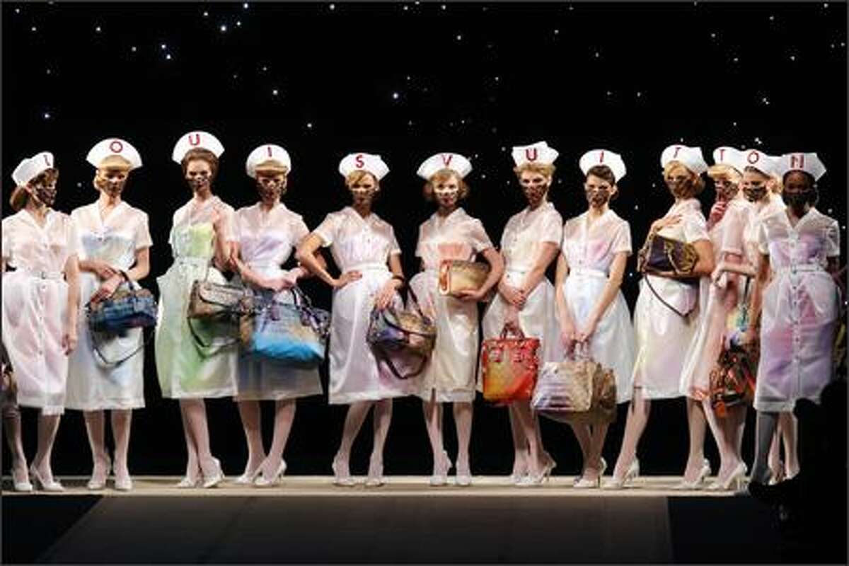 Models present creation by US designer Marc Jacobs for Louis Vuitton during Spring/Summer 2008 ready-to-wear collection show in Paris.