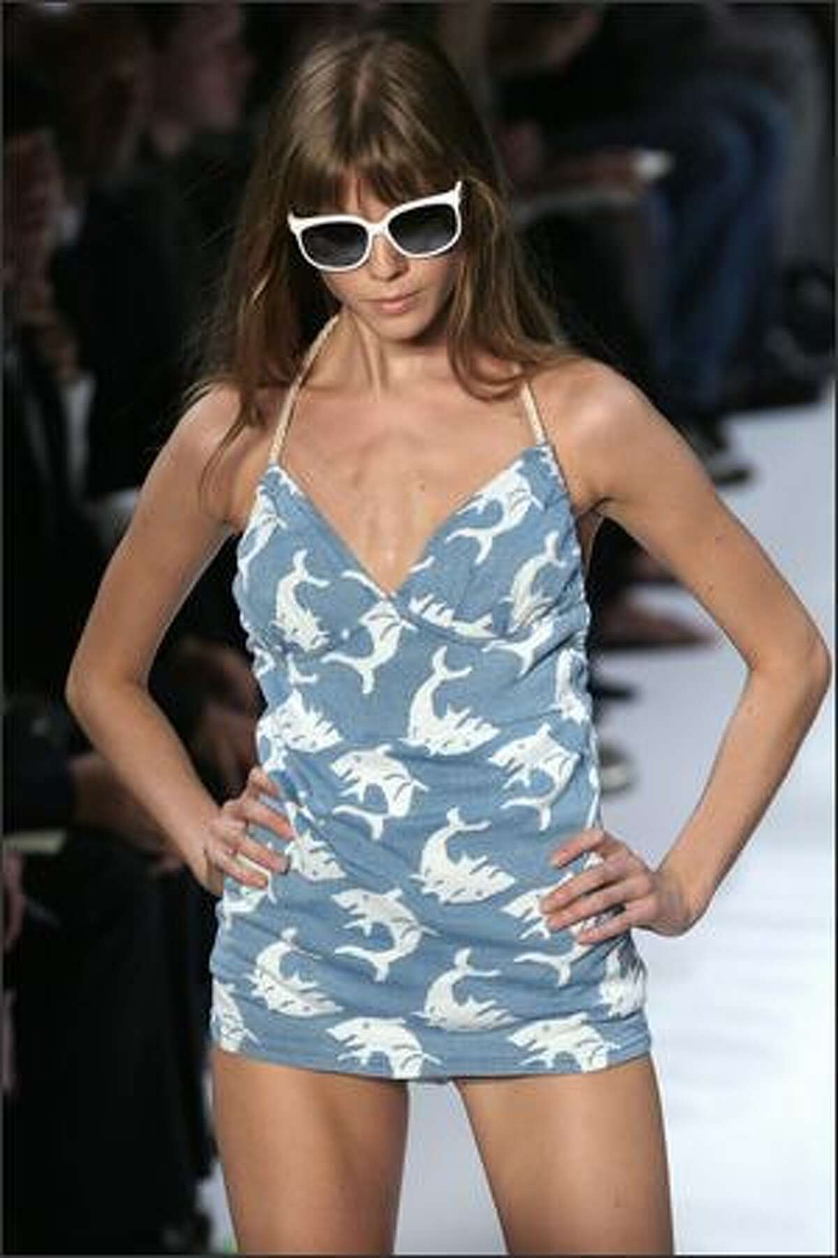 A model presents a creation by British designer Stella McCartney during Spring/Summer 2008 ready-to-wear collection show in Paris.