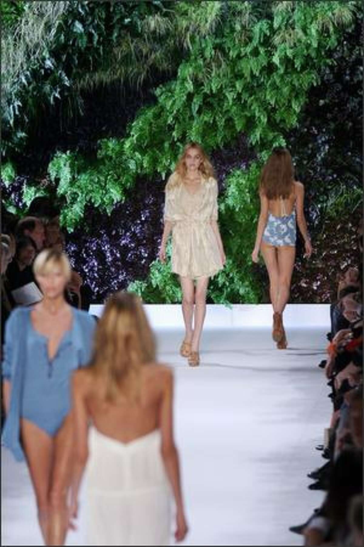 Models present creations by British designer Stella McCartney during Spring/Summer 2008 ready-to-wear collection show in Paris.