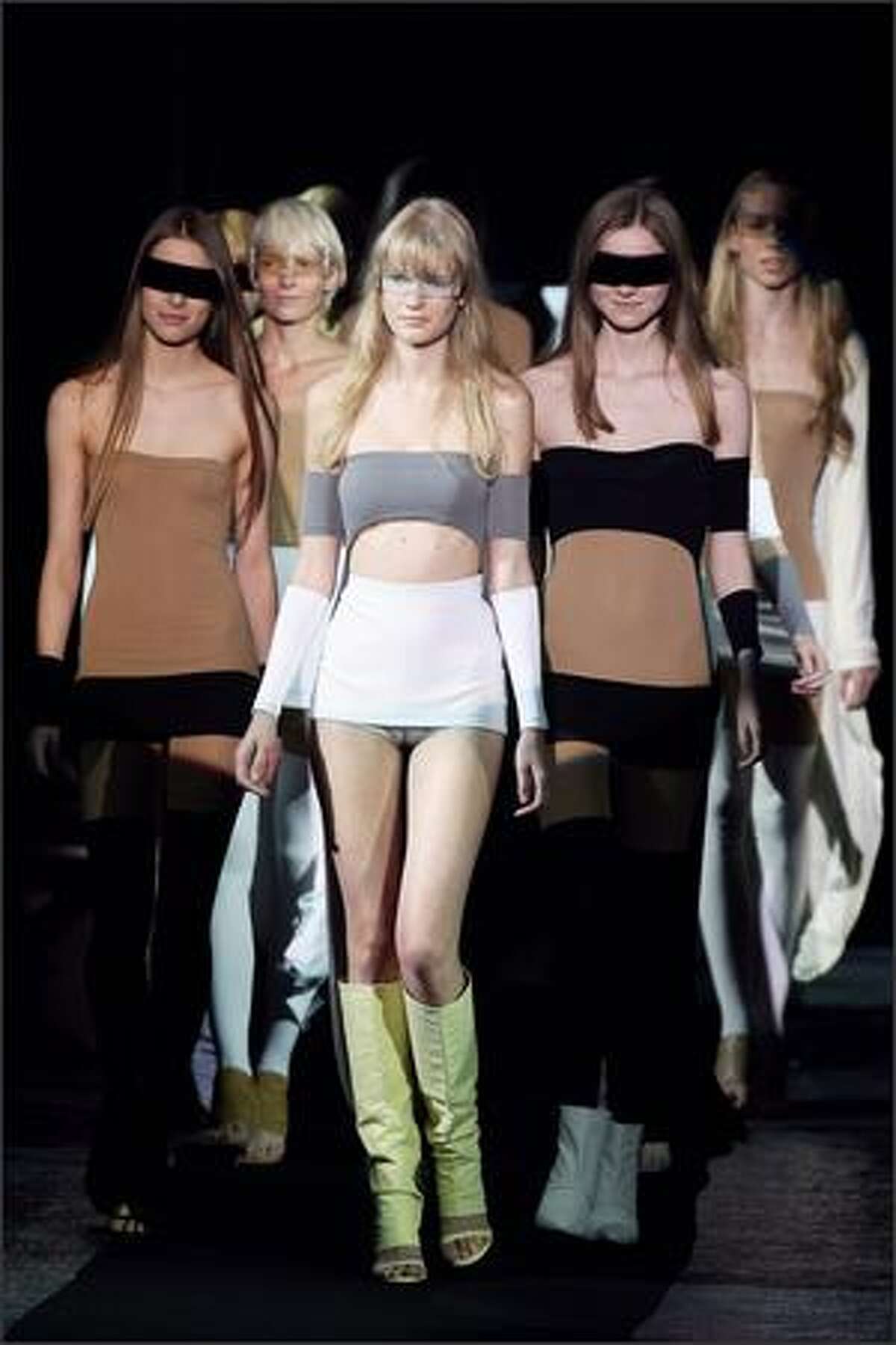 Models present creations by Maison Martin Margiela during the Spring/Summer 2008 ready-to-wear collection show in Paris.
