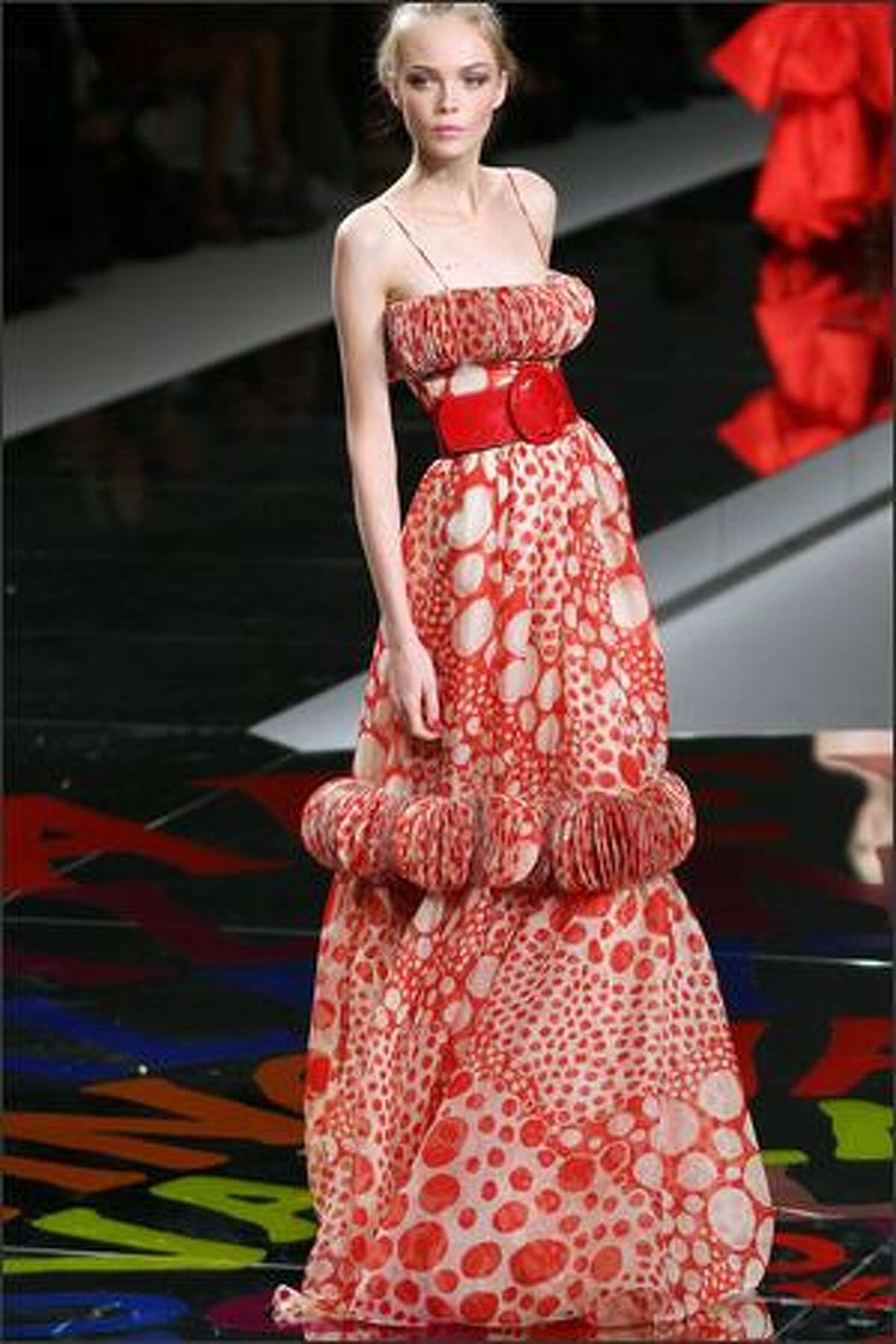 A model presents a creation by Valentino.