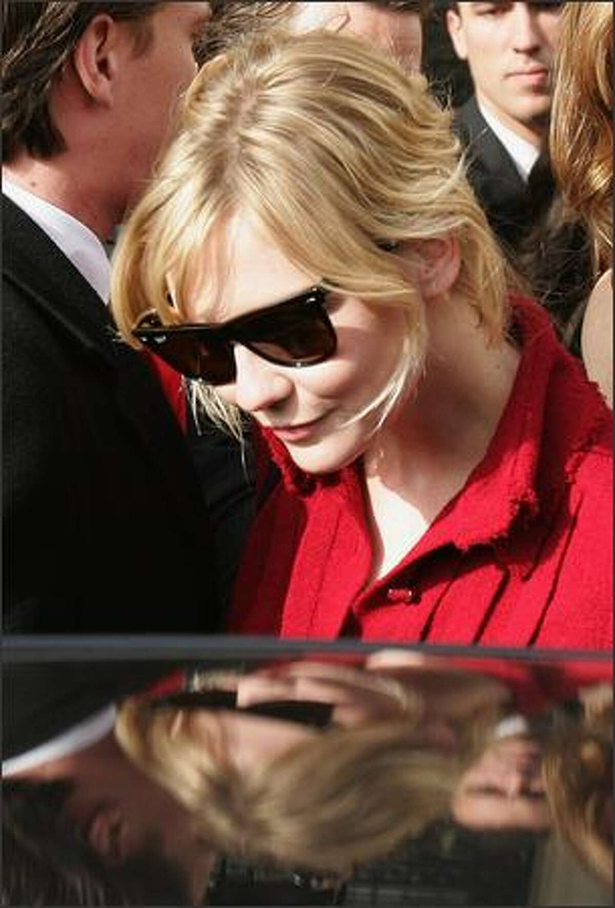 Actress Kirsten Dunst leaves after attending the Chanel Fashion show during the Paris Fashion Week Sp/Sum October 5, 2007 in Paris, France.