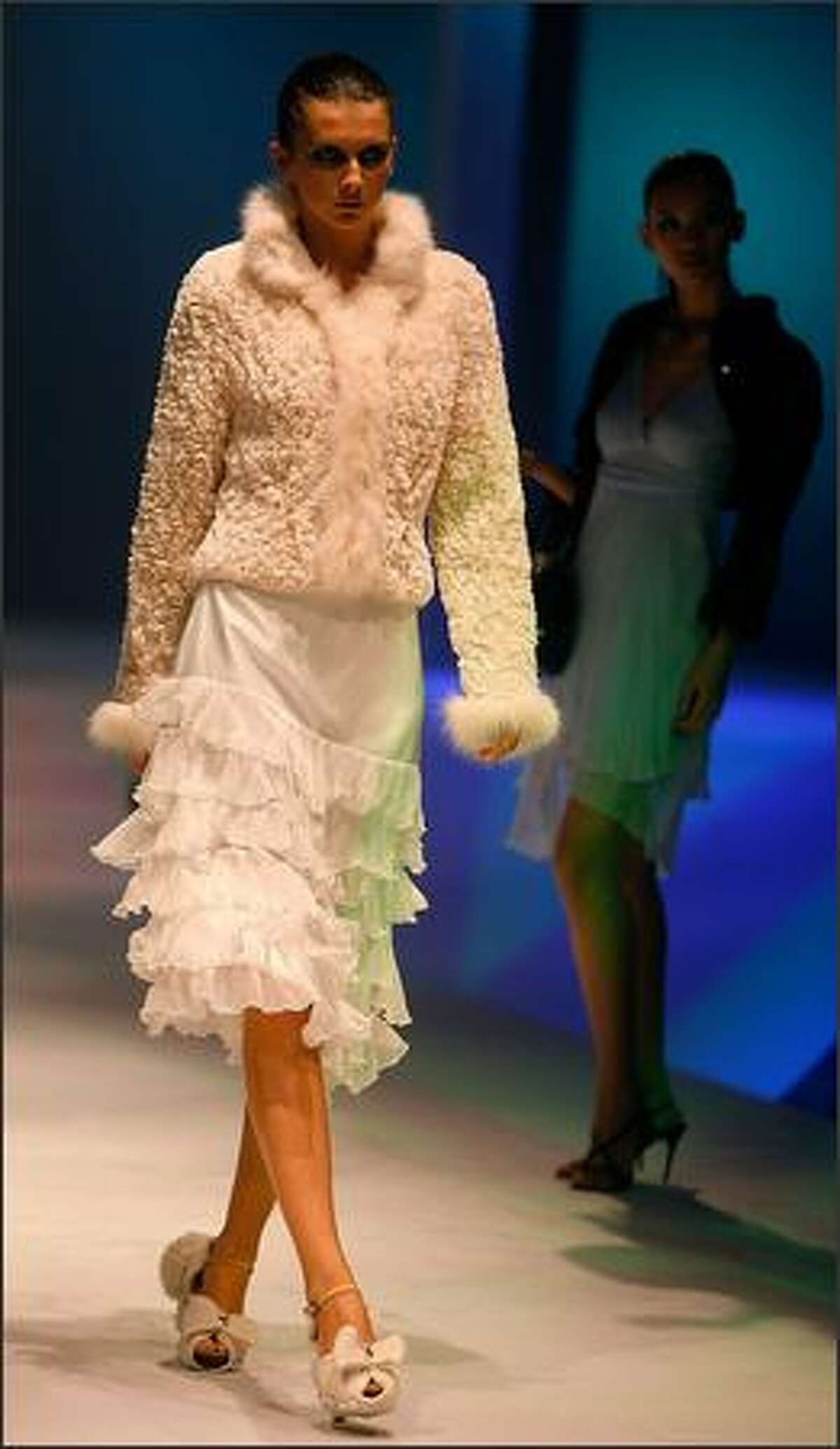Models walk the runway during the fashion show of Chinese brand "1436" at the 2007 Shanghai Fashion Week on October 28, 2007 in Shanghai, China.