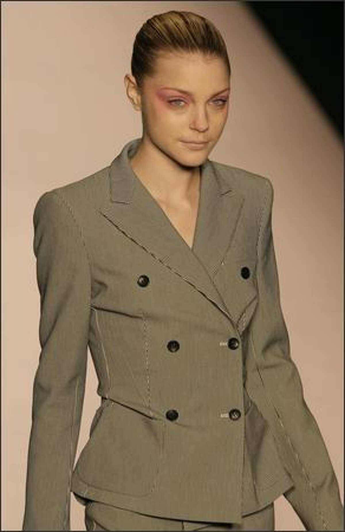 A model presents a creation by Italian fashion house Max Mara during the Spring/Summer 2008 collections of the Milan ready-to-wear fashion shows.