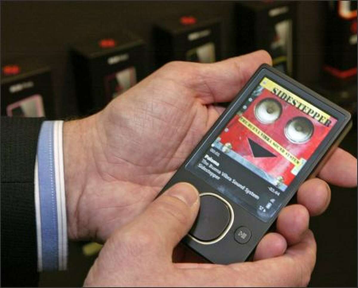 Microsoft's new 80GB Zune media player, which uses a combination touch/push pad for navigation.