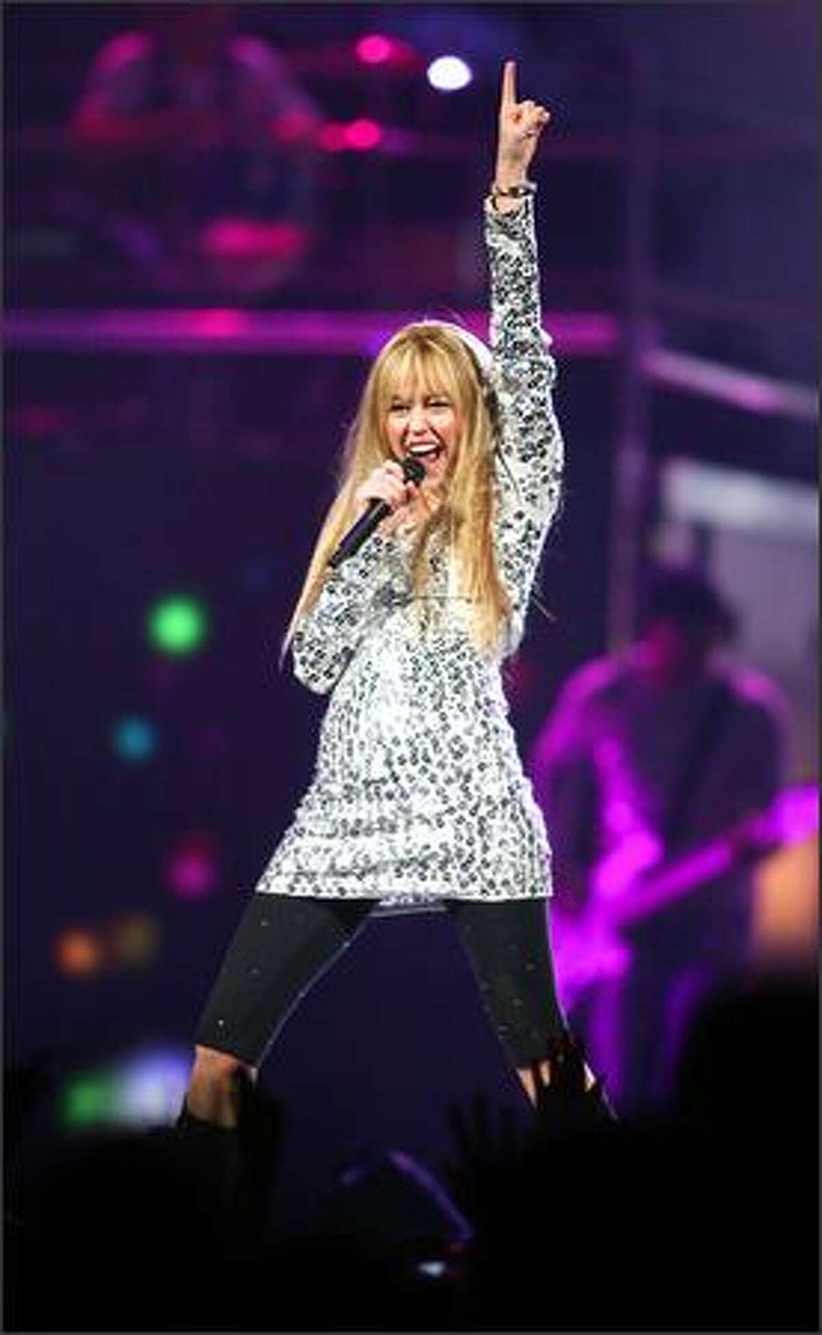 Miley Cyrus aka Hannah Montana performs during her concert at Key Arena.