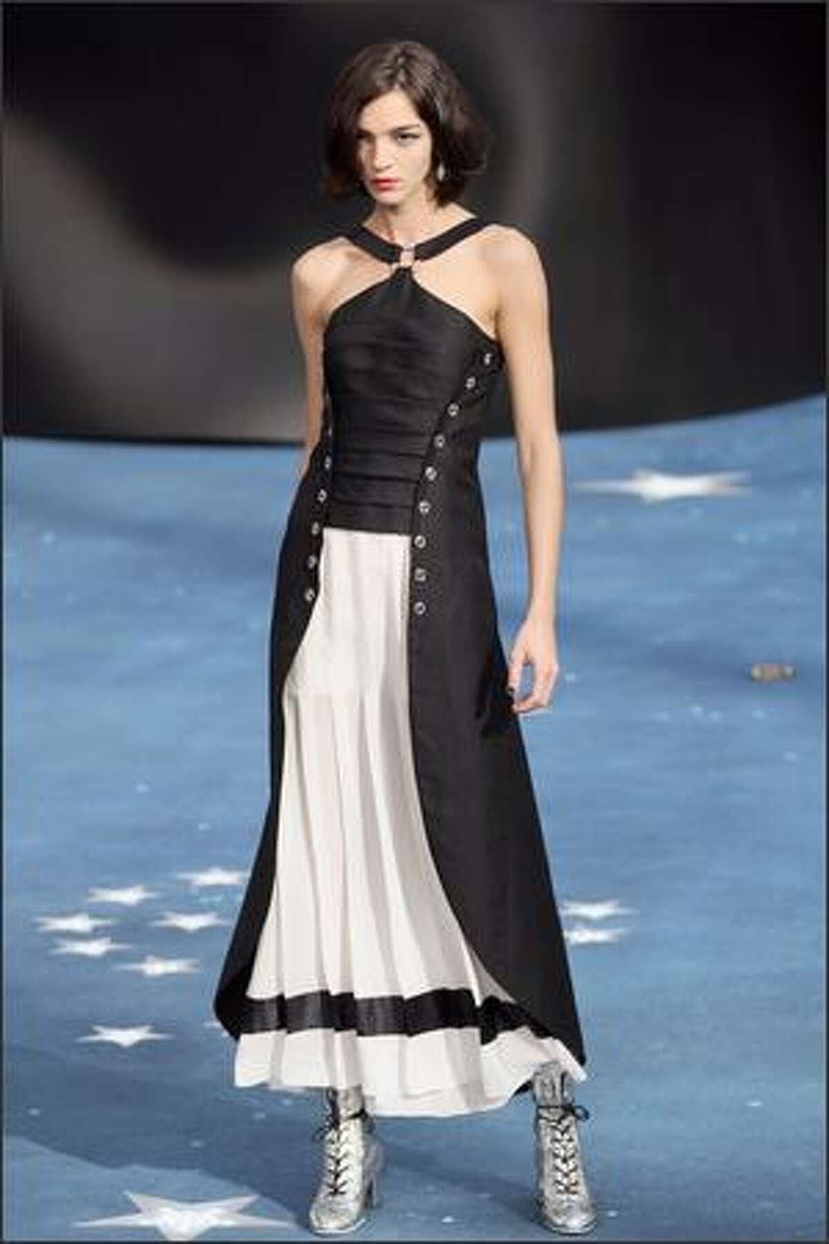 Italian model Maria Cala Boscono presents a creation by Lagerfeld for Chanel during Spring/Summer 2008 ready-to-wear collection show in Paris.