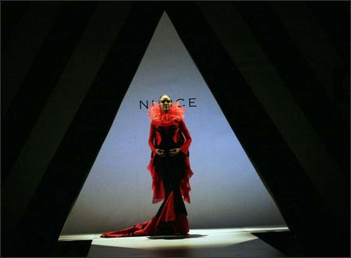 A model wearing a creation of Albanian designer Mirela Nurce walks the catwalk during the first day of 'Tirana Fashion Week' in Tirana, 25 October 2007. Creators from Albania, Kosovo, Macedonia and Greece will take part during this fashion week event.
