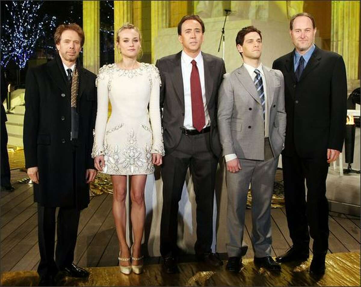 Left to right, Producer Jerry Bruckheimer, actress Diane Kruger, actor Nicolas Cage, actor Justin Bartha and director Jon Turteltaub attend the Premiere for a film "National Treasure" at Roppongi Hills on Dec. 6, 2007 in Tokyo, Japan. The film will open on December 21 in world wide.