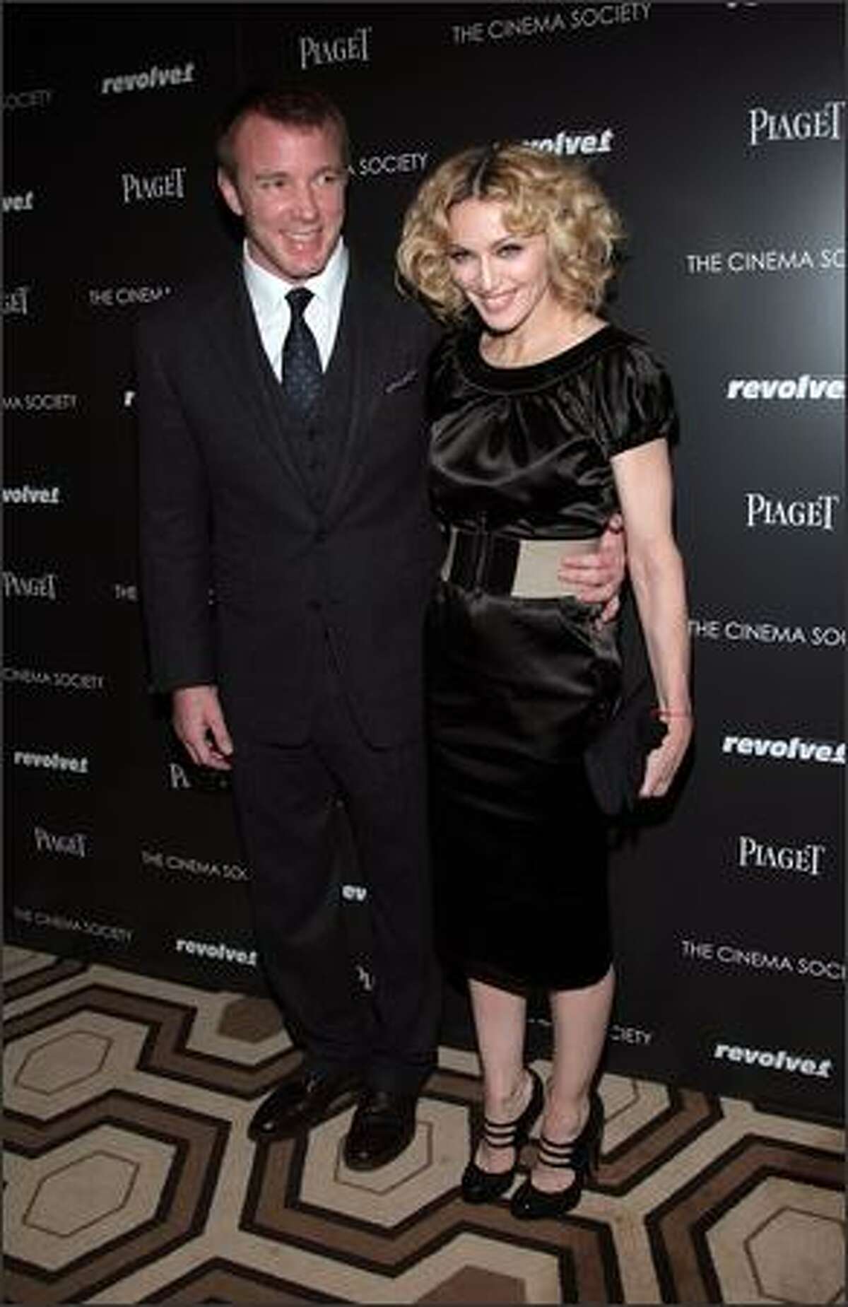 Writer/director Guy Ritchie and musician Madonna attend a screening of "Revolver" hosted by the Cinema Society and Piaget at the Tribeca Grand Screening Room on Sunday in New York City.