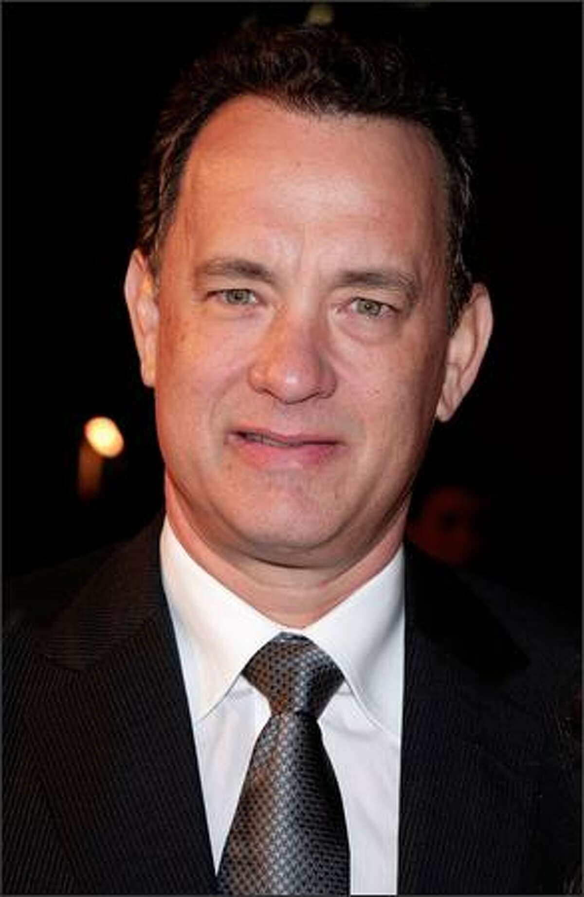 Actor Tom Hanks arrives at the Universal Pictures' premiere of "Charlie Wilson's War" held at CityWalk Cinemas on Monday in Los Angeles, Calif.
