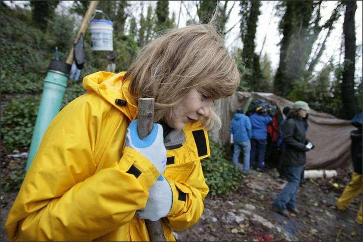 Patricia McInturff, Director of the City of Seattle Human Service Department during a recent media tour of a homeless encampment located in the hills just north of 1170 Elliott Ave.