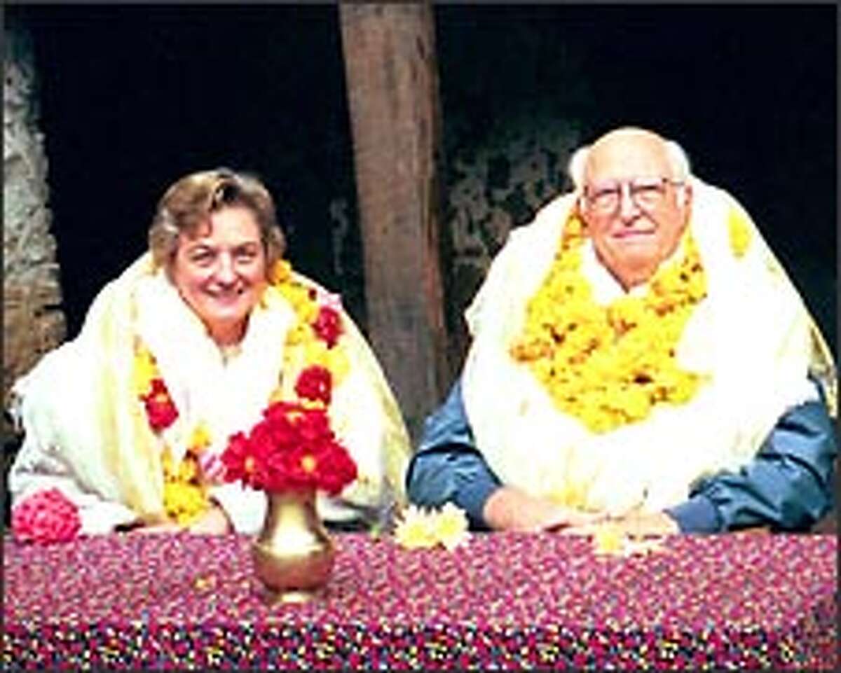 Suzanne Cluett and Bill Gates Sr. were welcomed in October 1999 with flower leis and kata scarves to Junbasi, Nepal.