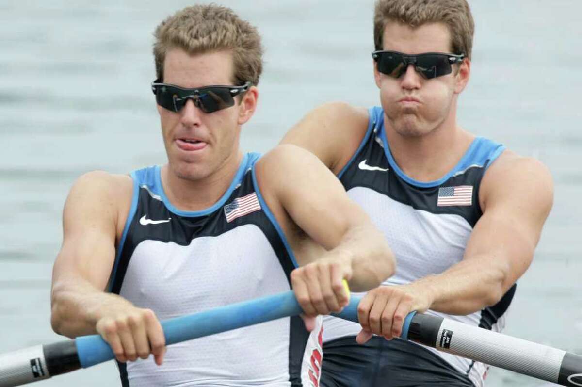 USA's Cameron Winklevoss, left, and twin brother Tyler, Greenwich natives, take the start of their men's pair repechage at the Beijing 2008 Olympics in 2008. (AP Photo/Gregory Bull)