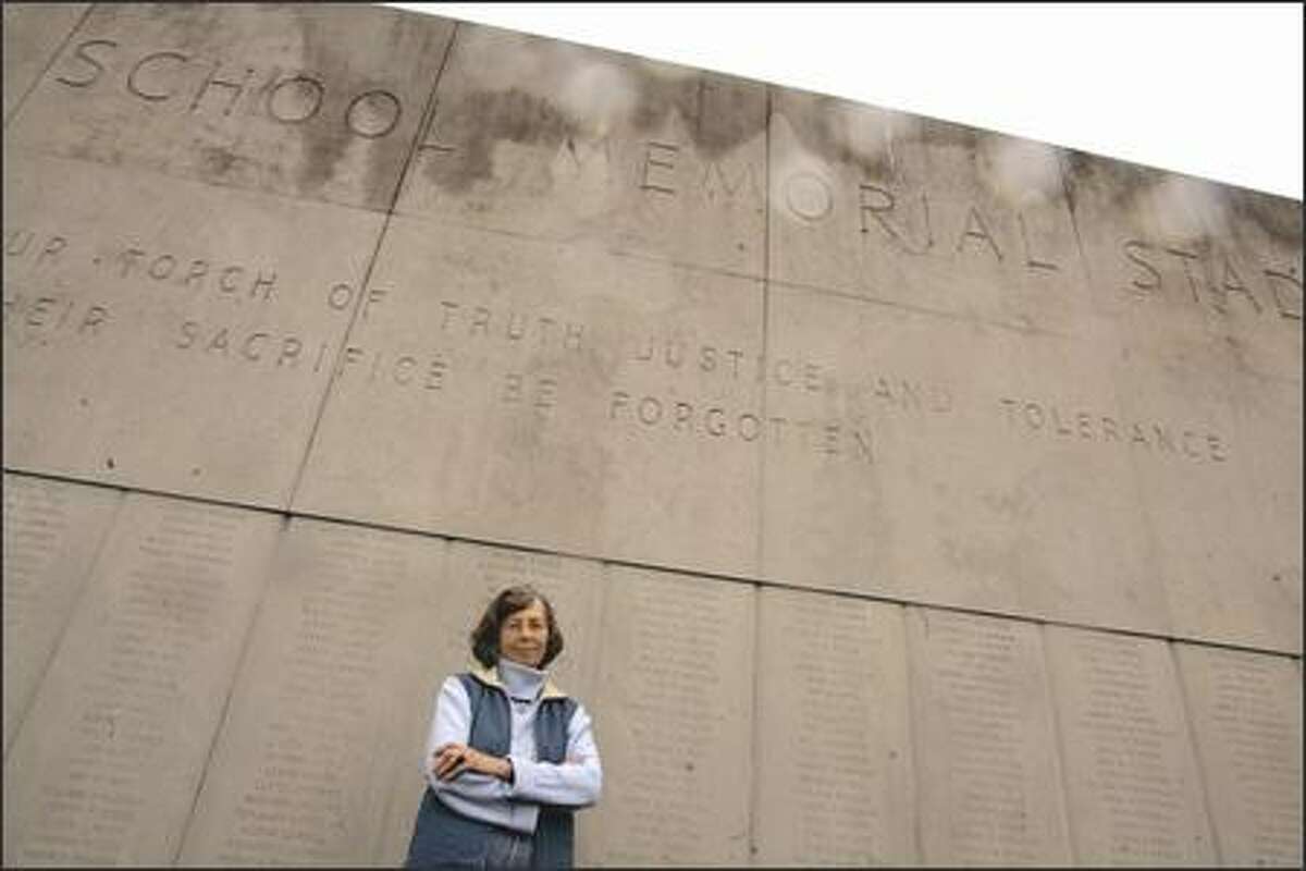 Fifty-five years ago today, Marianne Hanson cut the ribbon on the memorial wall she designed to honor Seattle high school students who died during World War II. Returning Sunday, near right, she found the site in a state of neglect.