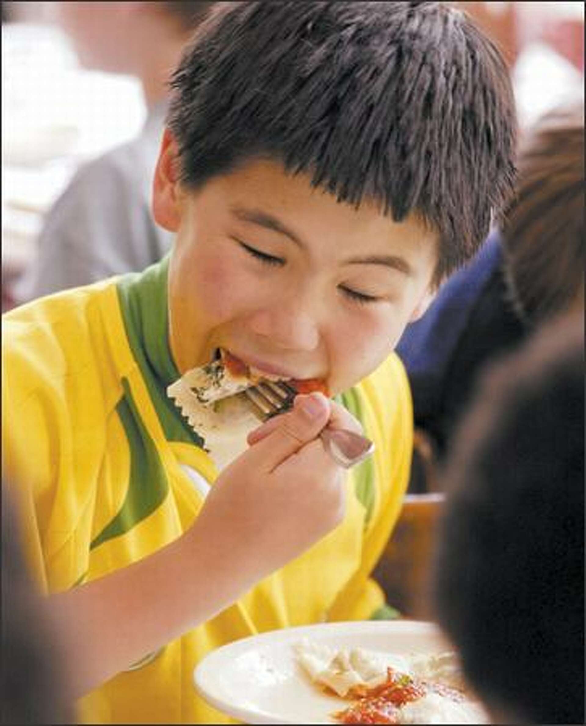 Students enjoy the fruits of the Ravioli Project