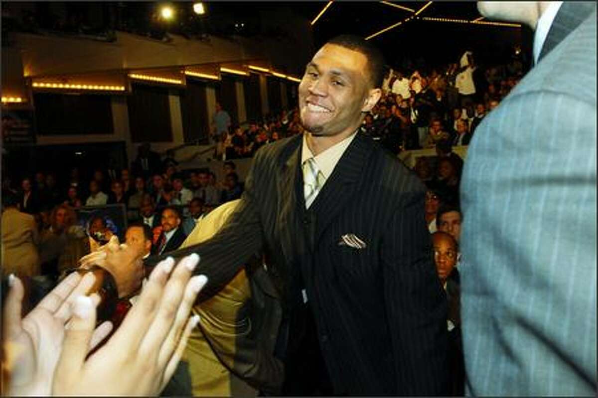 Brandon Roy is all smiles after being selected with the No. 6 pick by the Minnesota Timberwolves. He was later traded to Portland.