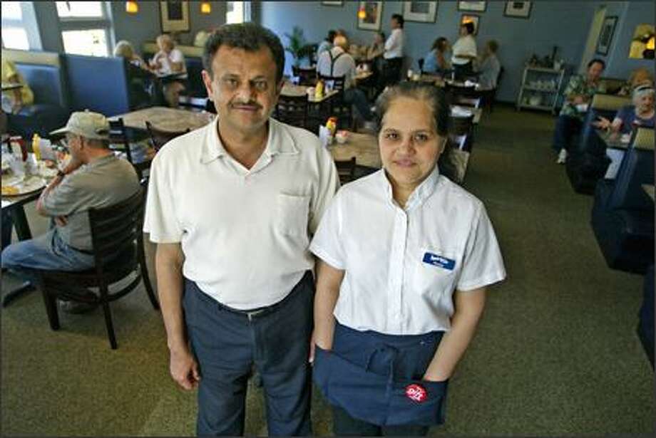Shabbir Bala and his wife, Ruqqy Bala, own the Boondocker's Cafe in Marysville. The Pakistani Americans say they've become "ambassadors" for the Muslim religion. Photo: Gilbert W. Arias/Seattle Post-Intelligencer