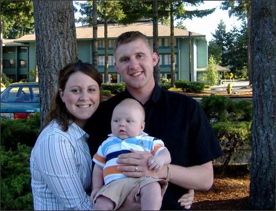 While Ryan Bailey is in Iraq, his wife, Danielle, is sharing their University Place home with son Jacob, relying on the support of family and friends. "It's scary, but I'm very proud of him," she said. Photo: Gilbert W. Arias/Seattle Post-Intelligencer