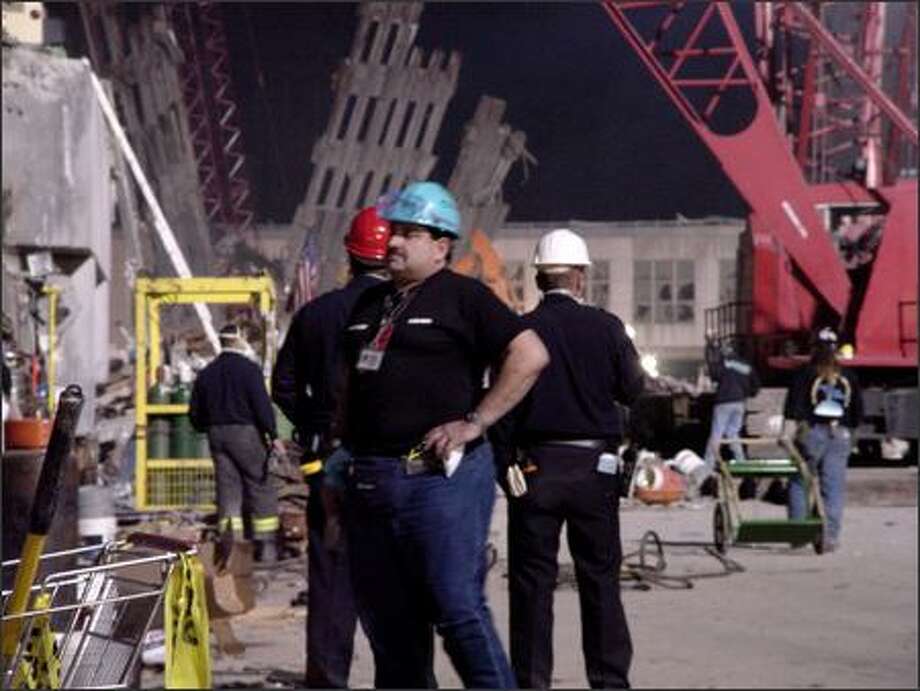 Lou Smit, a medicolegal death investigator who lives in Everett, went to New York to help pull remains from the World Trade Center ruins. Smit, who has 30 years of law enforcement experience, said he's become more emotional and has difficulty sleeping since working at Ground Zero. photo by Paul Moskvin Photo: Paul Moskvin