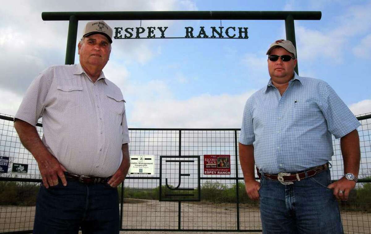 Edwin Espey (left) and son Justin run a cattle and hunting operation in McMullen County over the Eagle Ford shale formation. Their land would be taken under the National Guard plan.