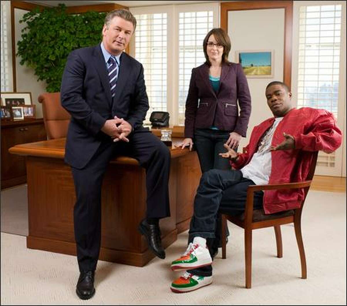NBC's "30 Rock," a new sitcom about network TV stars, from left, Alex Baldwin, Tina Fey and Tracy Morgan.