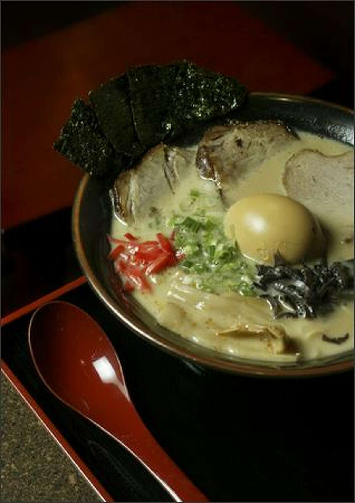 The Samurai Armour Bowl can be ordered with pork (above), chicken or fish broth. Toppings include pork slices, green onion, black mushrooms, flavored egg and roasted seaweed.