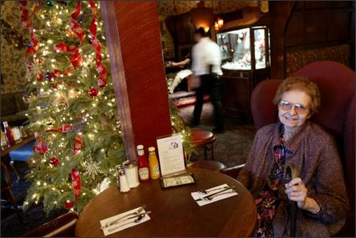 Juanita Wilson, 83, spends time Wednesday at Seattle restaurant Charlie's On Broadway, where she plans to be Christmas Day.