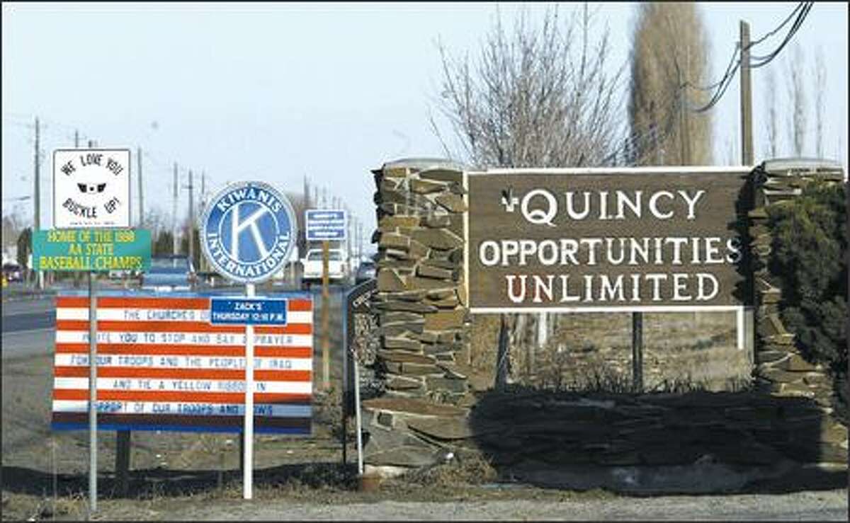 Once more inspirational than anything, Quincy's slogan is rapidly becoming reality, as Microsoft, Yahoo and Intuit build technology facilities in the quiet agricultural community and houses go up.
