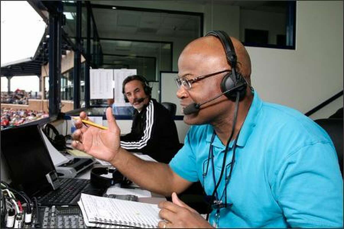 Dave Sims, right, with Rick Rizzs at spring training in Arizona, will share TV play-by-play duties with Dave Niehaus. Rizzs will handle radio exclusively.