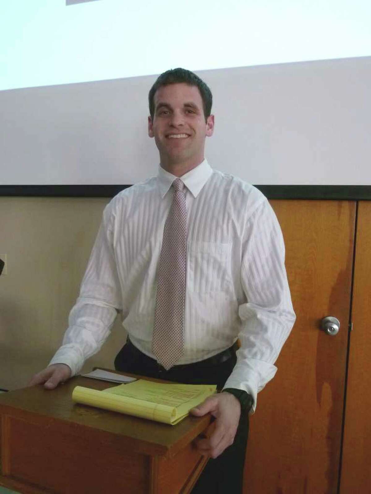 Weston native Michael Evans, founder of Full Court Peace, a non-profit organization with a mission of using team basketball to enhance education and build social capital around the world. He spoke about the project in Westport on Sunday.