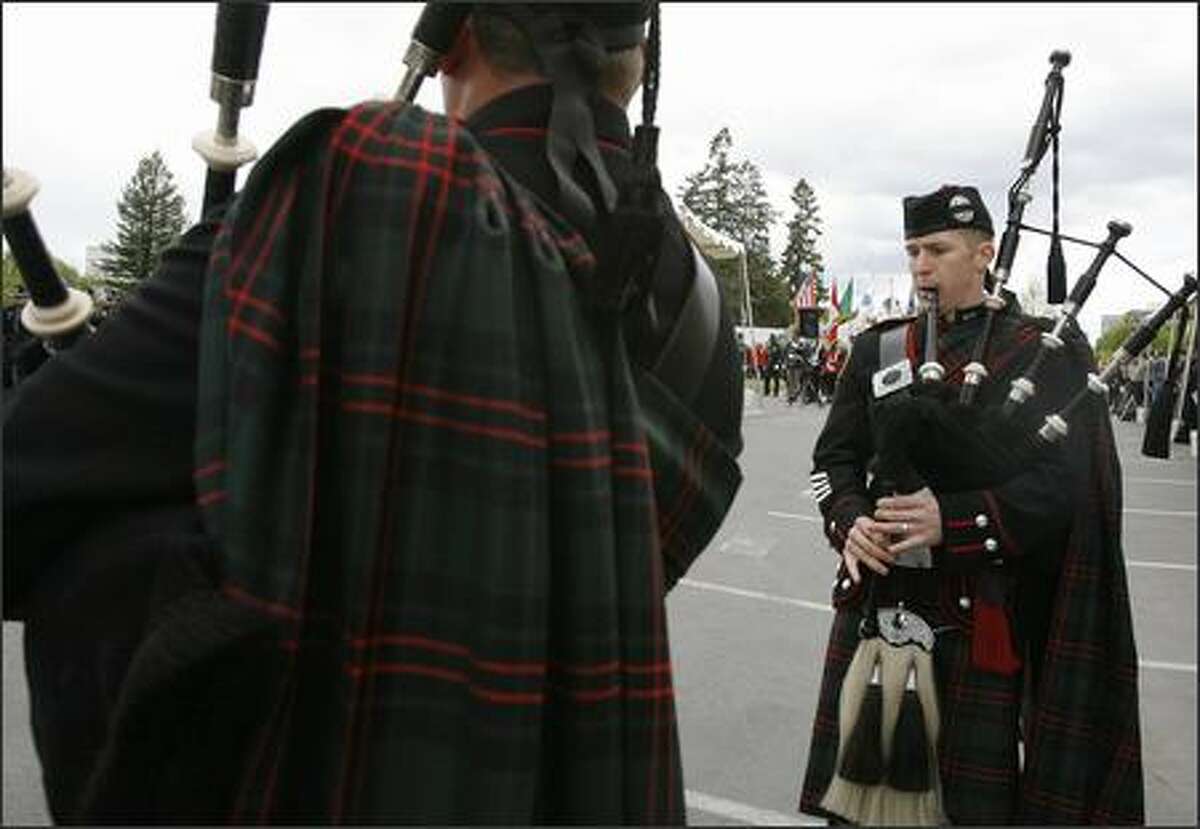 Firefighter pipes, drums honor fallen