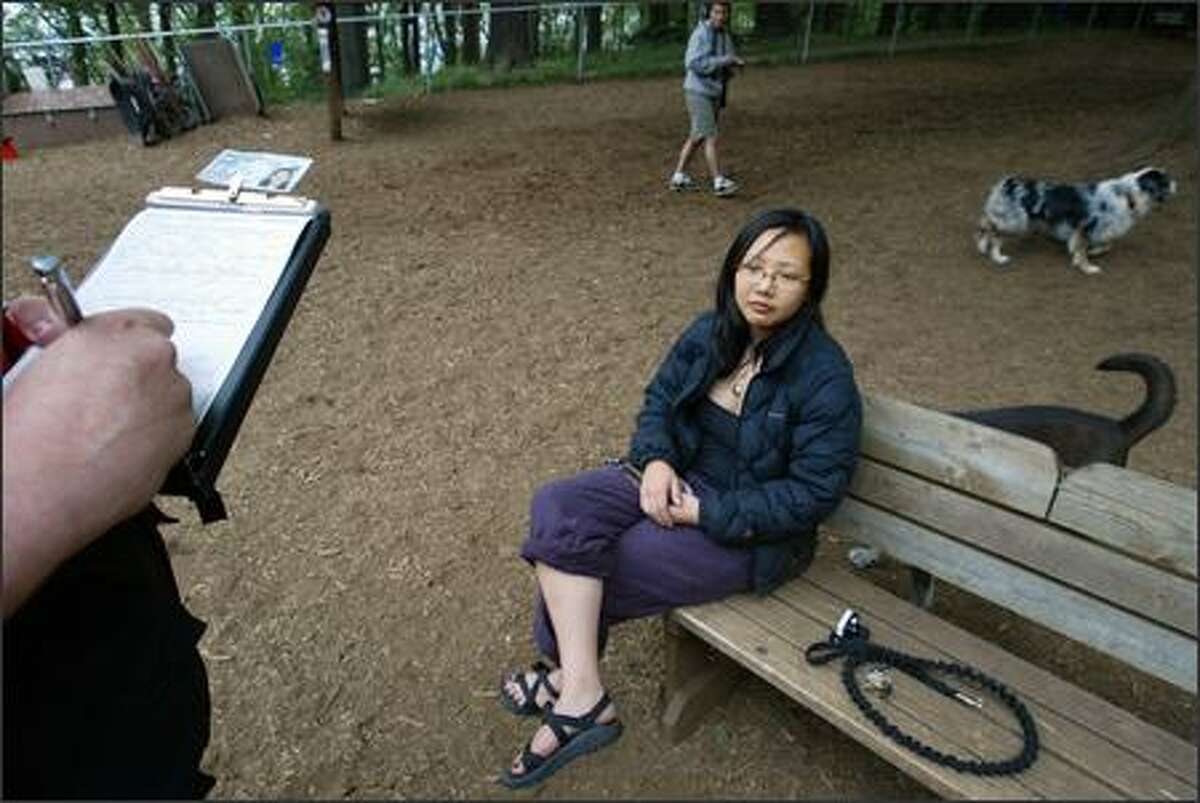 During a May 6 visit to the Golden Gardens off-leash area, Jennifer Tam gets a ticket for not having her dog Sylo licensed in the city of Seattle. Sylo was licensed in Oregon, and Tam said she didn't know there was a time limit on licensing the animal in a new place. She said she felt like she should have gotten a warning.