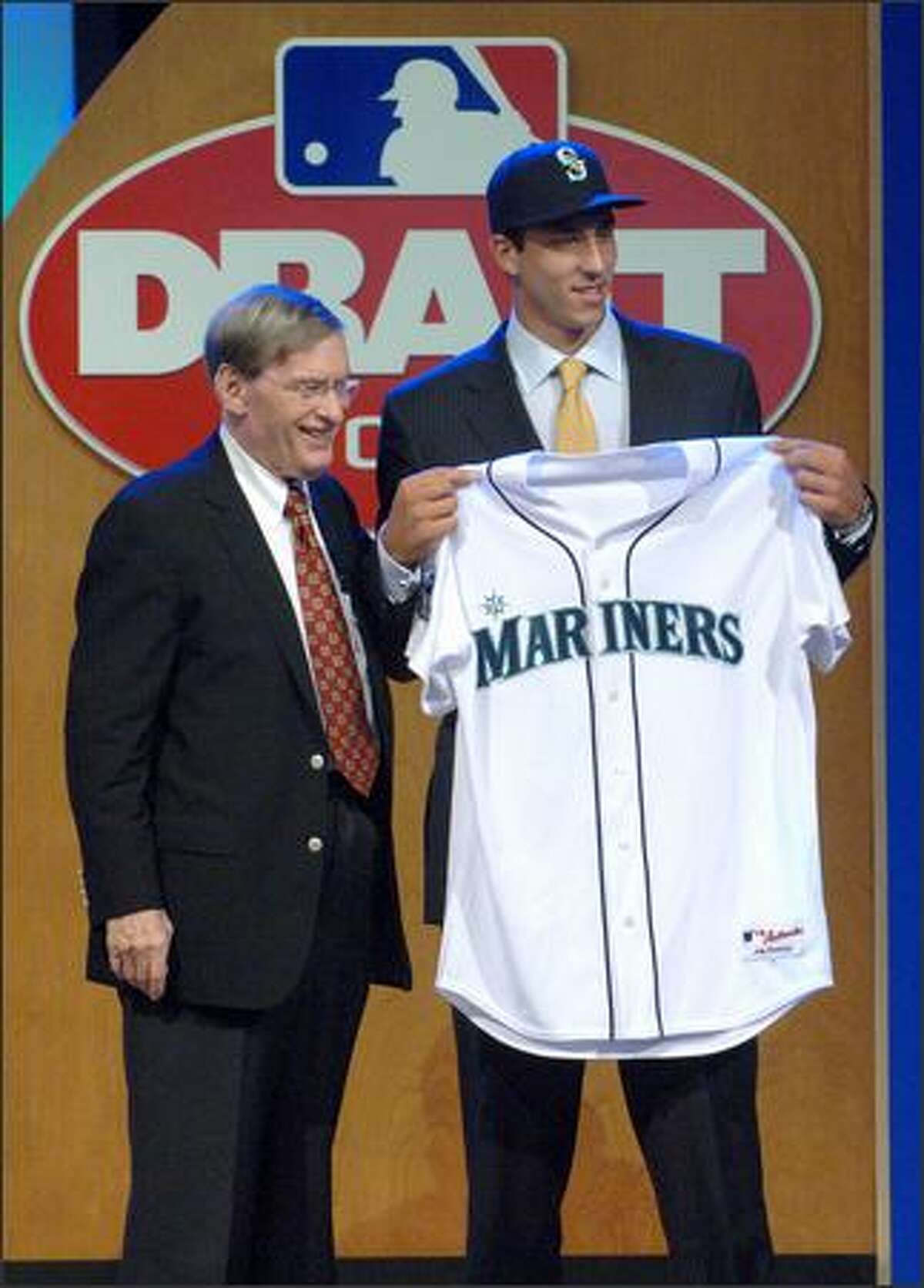 Baseball Commissioner Bud Selig poses with Phillippe Aumont, whom the Mariners drafted Thursday. "He's a very special person," a Seattle scout said of Aumont.